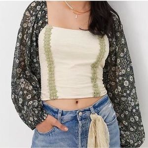 Anthropologie balloon sleeve green top.